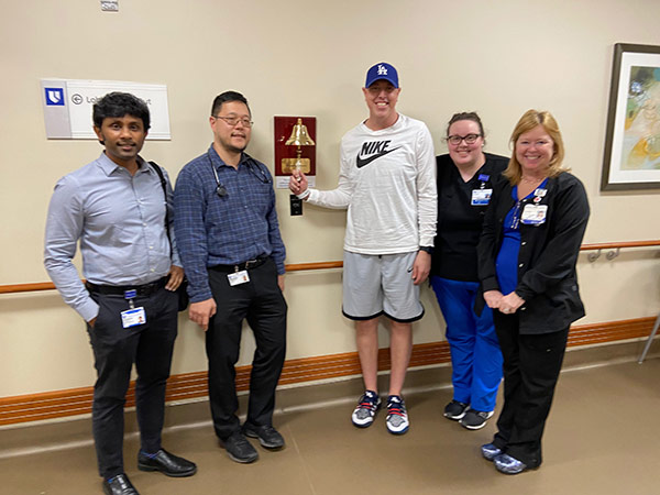 Matt Cross with various hospital staff