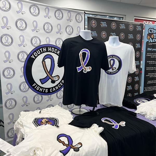 Photo of merch from the Youth Hockey Fights Cancer event